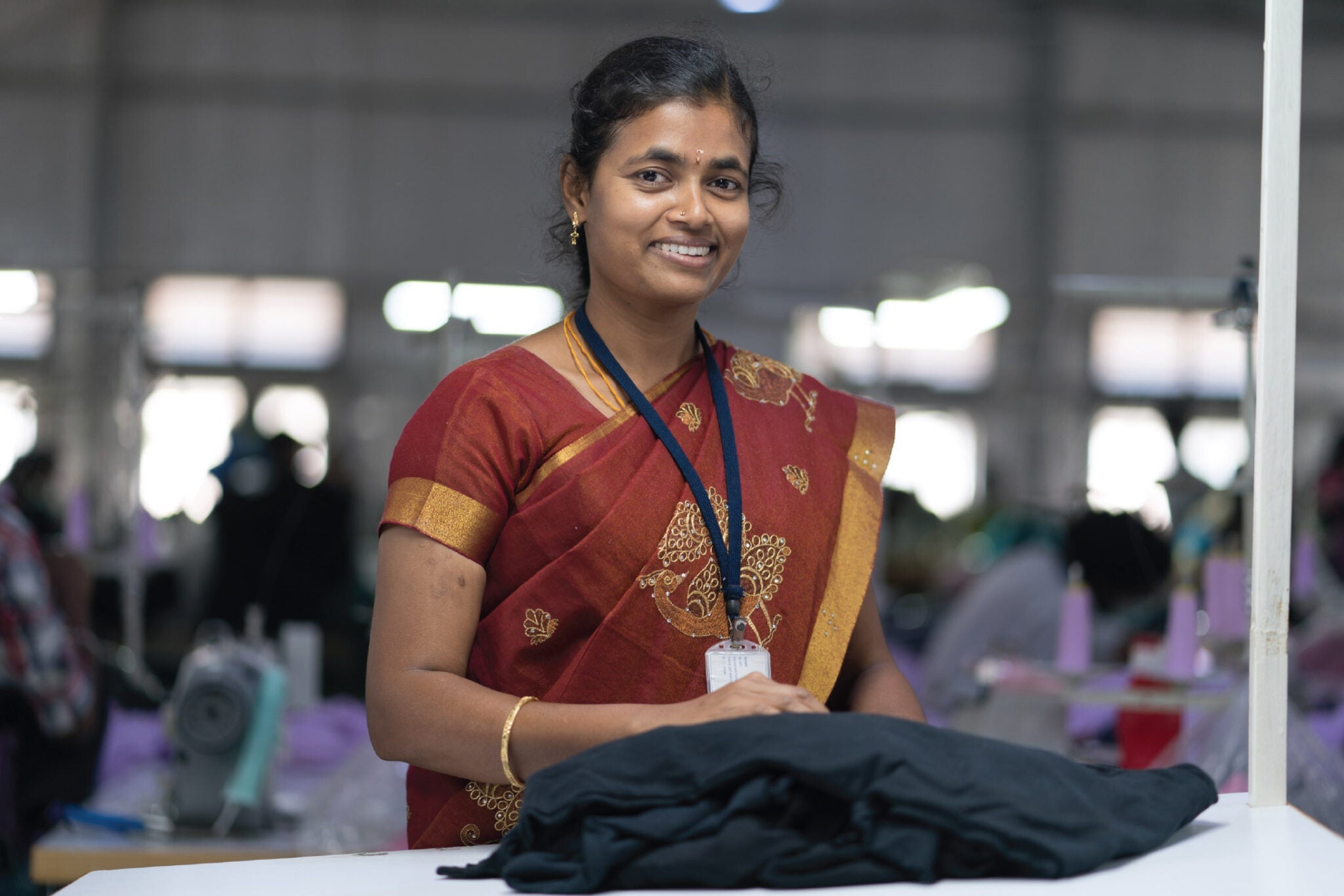 Maker Jegadeeswari V. at a 168飞艇开奖记录、168飞艇开奖结果号、幸运飞行艇官方开奖历史记录、168幸运飞行艇开奖结果 fair trade Certified Factory in Tirupur, Tamil Nadu, India.